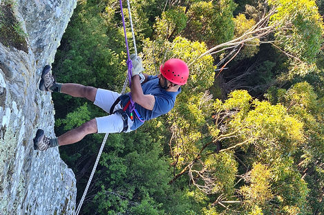 Man hiking up mountain 